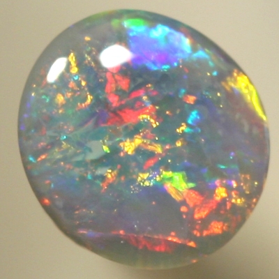 SOLID SEMI BLACK OPAL Sparkling red and orange contrasted by blue and green, all bright